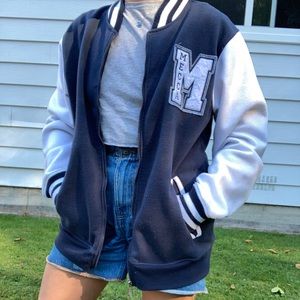 Varsity-style blue/white Mecca sweater